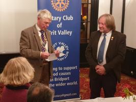 Adrian "Dougal" Scadding being welcomed into the Rotary Club of Brit Valley, by President Ian Ibbotson.